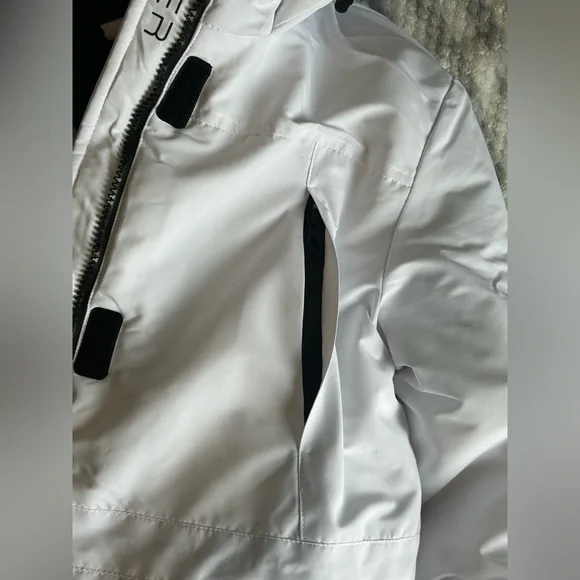 Spyder Women's White and Black long puffer jacket - Picture 9 of 16